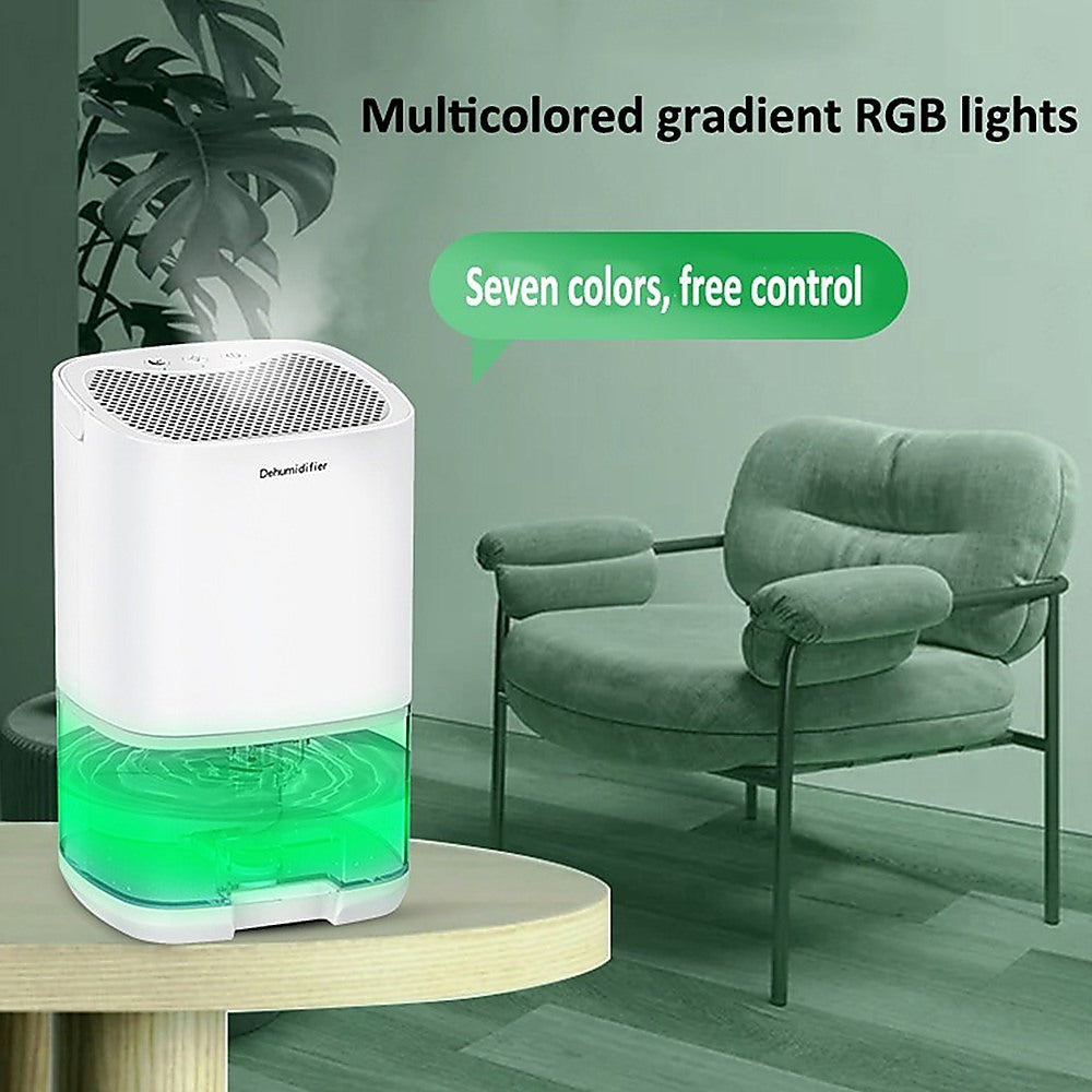 Compact 1000ML Mini Dehumidifier size comparison with common office items showing portability