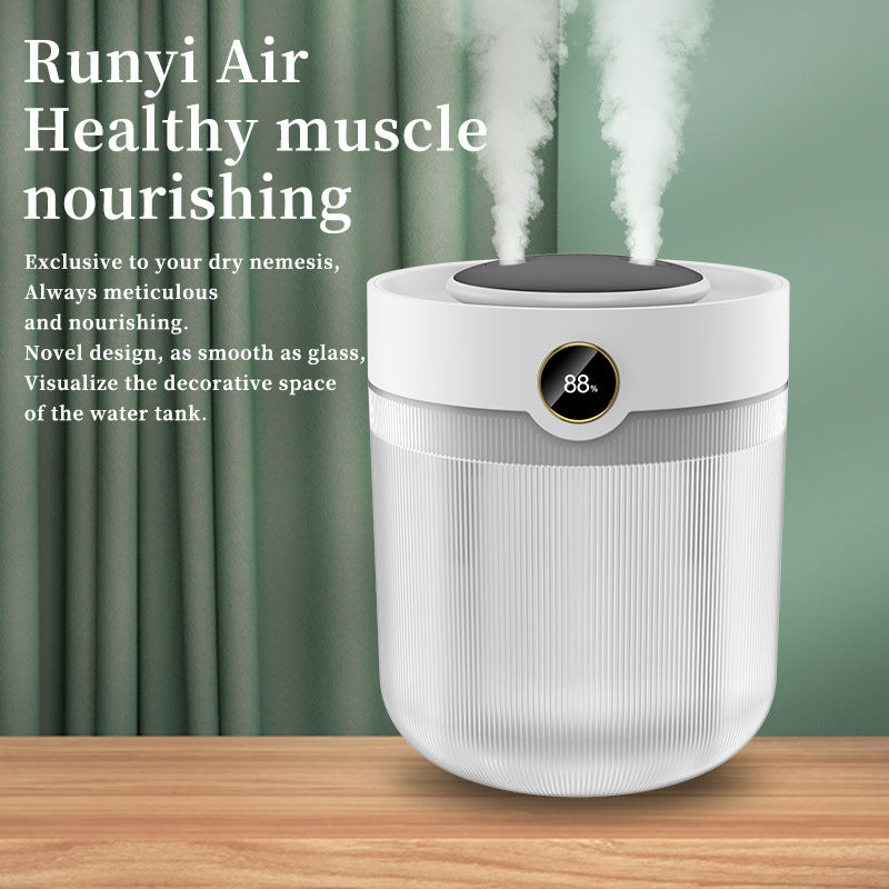 White air humidifier with steam on a wooden surface and green curtain background